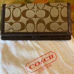 COACH checkbook wallet.